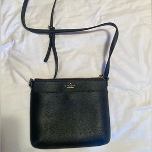 Small KATE SPADE crossbody. Black leather with gold colored hardware. EUC.